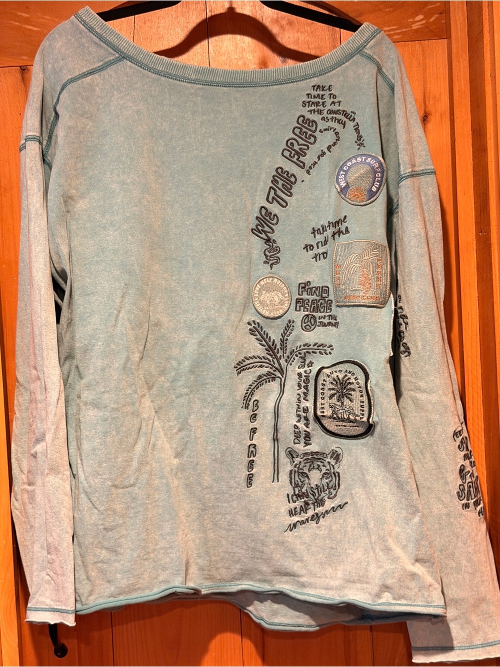 We The Free Women's Long Sleeve “Ivy Tee” in Light Aqua Blue with Black Graphics